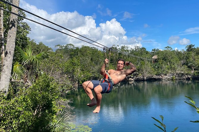 4 Private Cenotes, Zip-Lines, Canoes & Mayan Village with Delicious Lunch - Zip-lines over the jungle: fast fun with room for photos