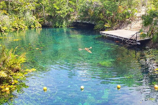 4 Private Cenotes, Zip-Lines, Canoes & Mayan Village with Delicious Lunch - Cenote snorkeling in open sinkholes and calmer water spots