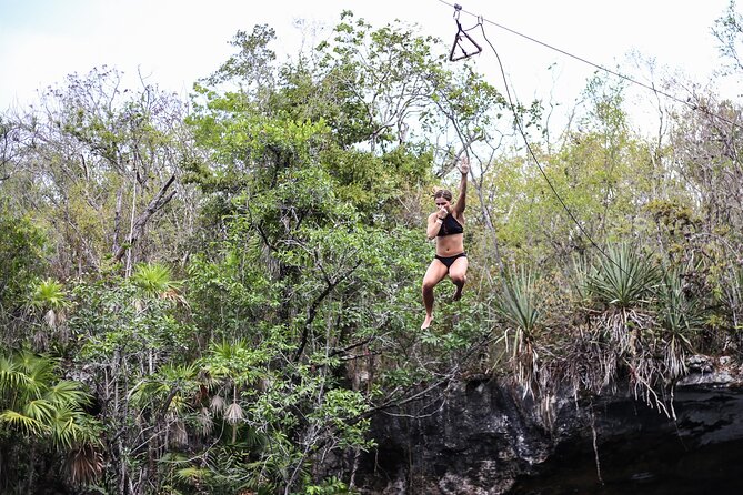 4 Private Cenotes, Zip-Lines, Canoes & Mayan Village with Delicious Lunch - Canoes and secluded cave swimming: a slower rhythm
