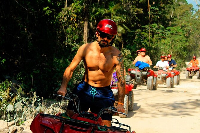 ATV Cenote and Zipline Adventure from Tulum - Cenote time: semi-dry cave light, tunnels, and a guided swim
