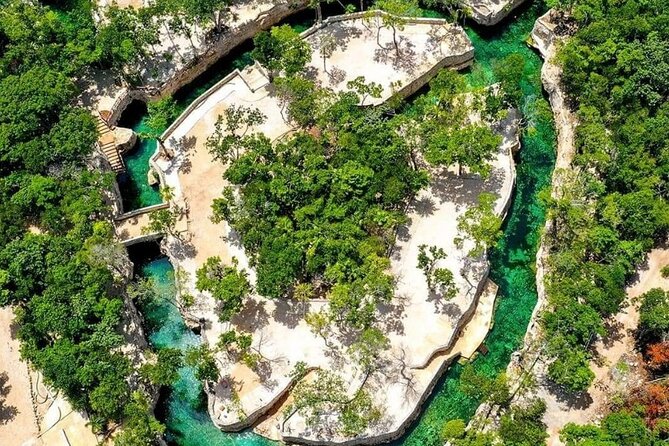Explore Tulum Tour to Cenote and Ruins - Entering the Tulum Archaeological Site With Tickets in Hand