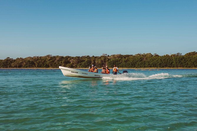 Half-Day Tour Discovering Sian Ka´an with Lunch - Stop 1: Sian Ka’an Biosphere Reserve and that calm boat rhythm