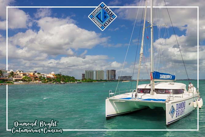 Luxury Catamaran tour to isla mujeres with transportation from Tulum - On Board: Restroom, Drinks, and the Energy Level You Should Expect