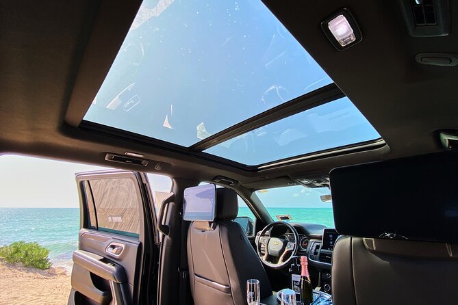 Luxury Suv departures from Tulum to Cancun Airport - What you get in the car: private comfort with a pro driver