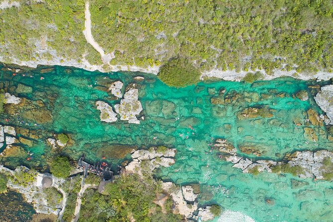 Magical Cenote and Paradise Lagoon Snorkeling Adventure - Cold water, wind, and what to pack for a smoother swim