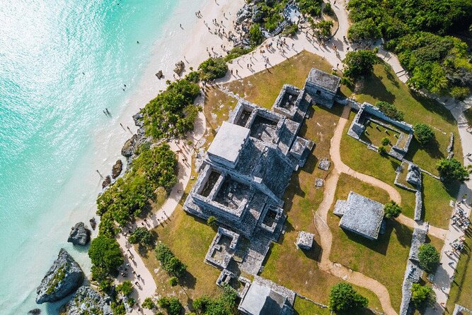 Private Half Day Tour to Tulum Temples and Downtown Shopping - Stop 1: Tulum Archaeological Site with Caribbean views