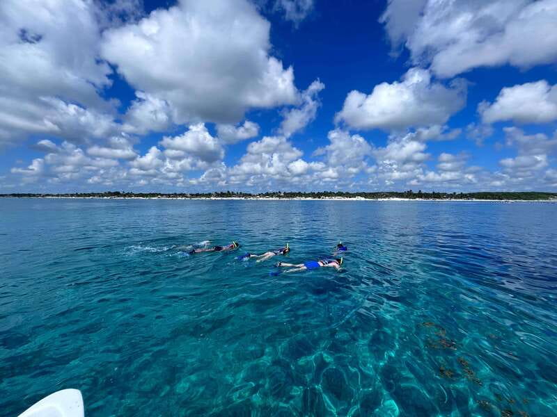 SNORKEL IN TULUM REEF, BOAT RIDE AND CALETA - Panoramic Boat Ride: Ruins, National Park Views, and Two Hidden Temples